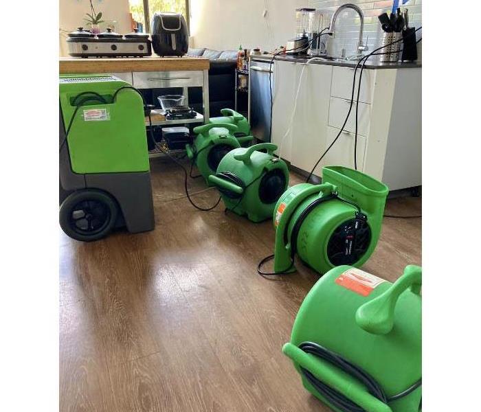 Air movers in apartment kitchen