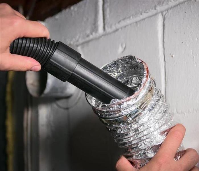 Vaccum cleaning a flexible aluminum dryer vent hose